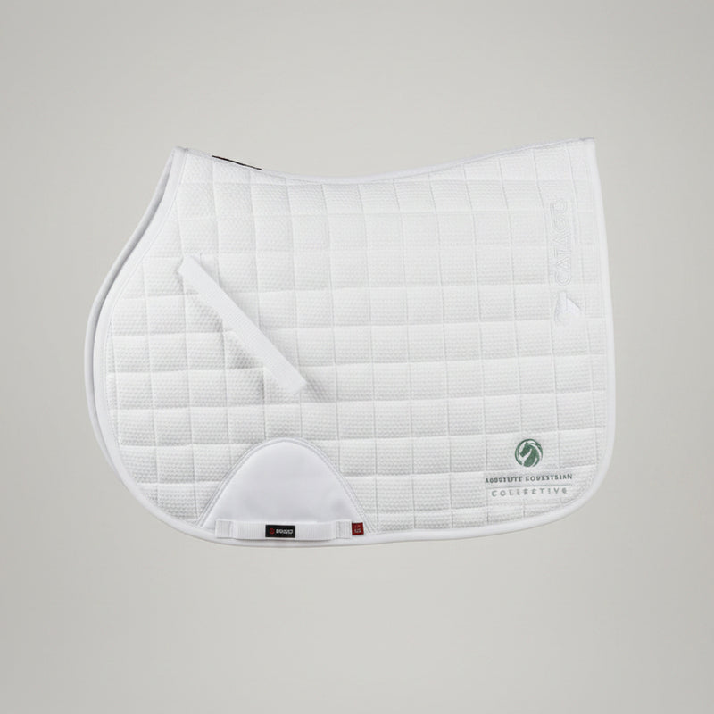 A white quilted equestrian saddle pad with a white leather girth loop and the Absolute Equestran Collective logo